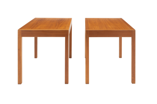 Two wooden side tables on a white background