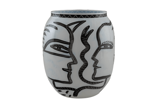 Ulrica Hydman-Vallien "Caramba" vase for Kosta Boda featuring black hand-painted faces, serpent, and flora motifs