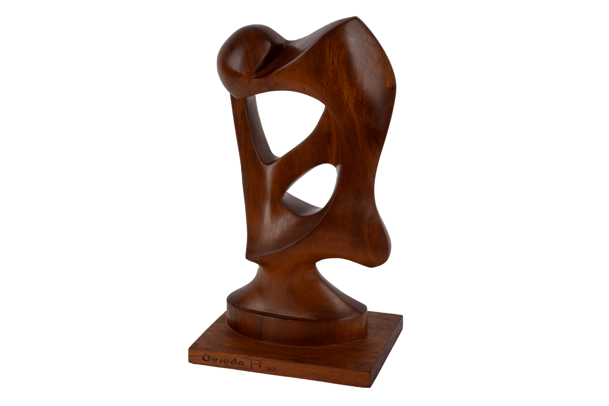 Abstract mid-century modern walnut sculpture with smooth curved forms on a square wooden base.