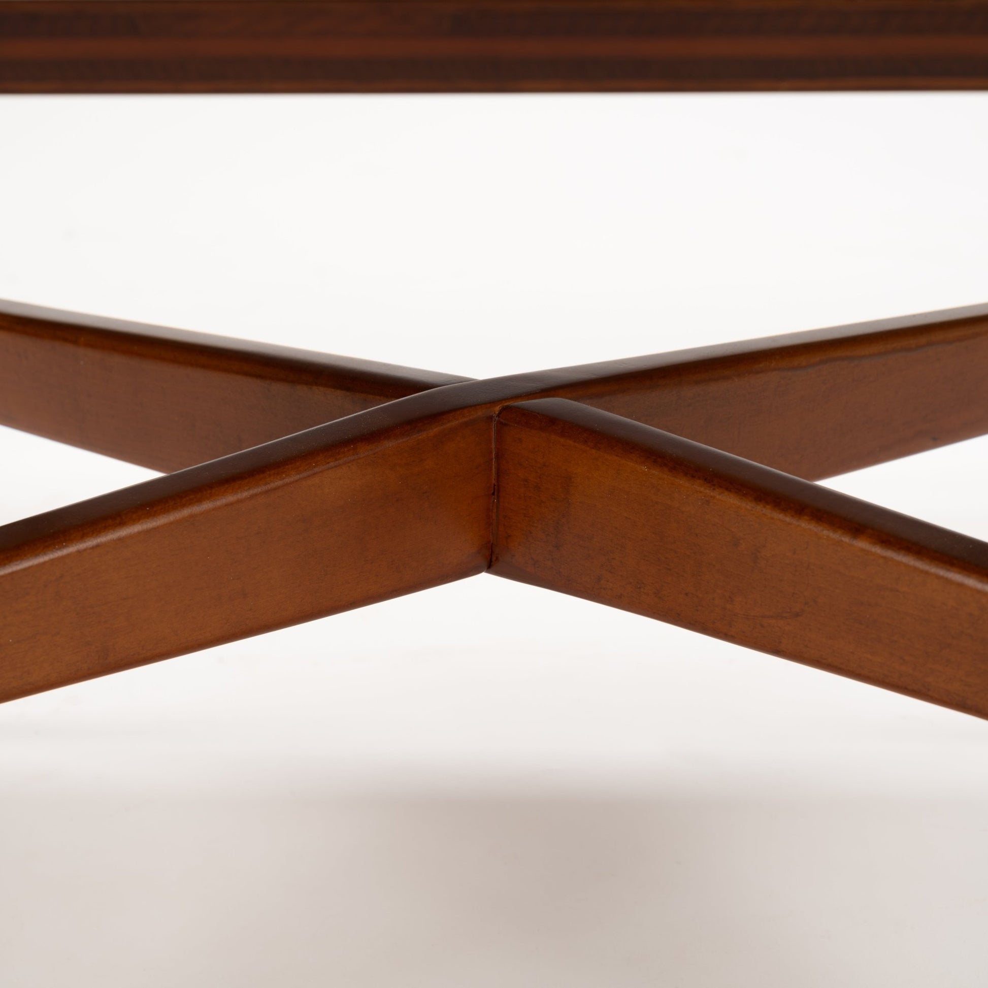 Walnut Side Table with Laminate Top featuring a close-up view of its warm walnut wood base with intersecting crossbeam supports, showcasing mid century modern furniture craftsmanship.