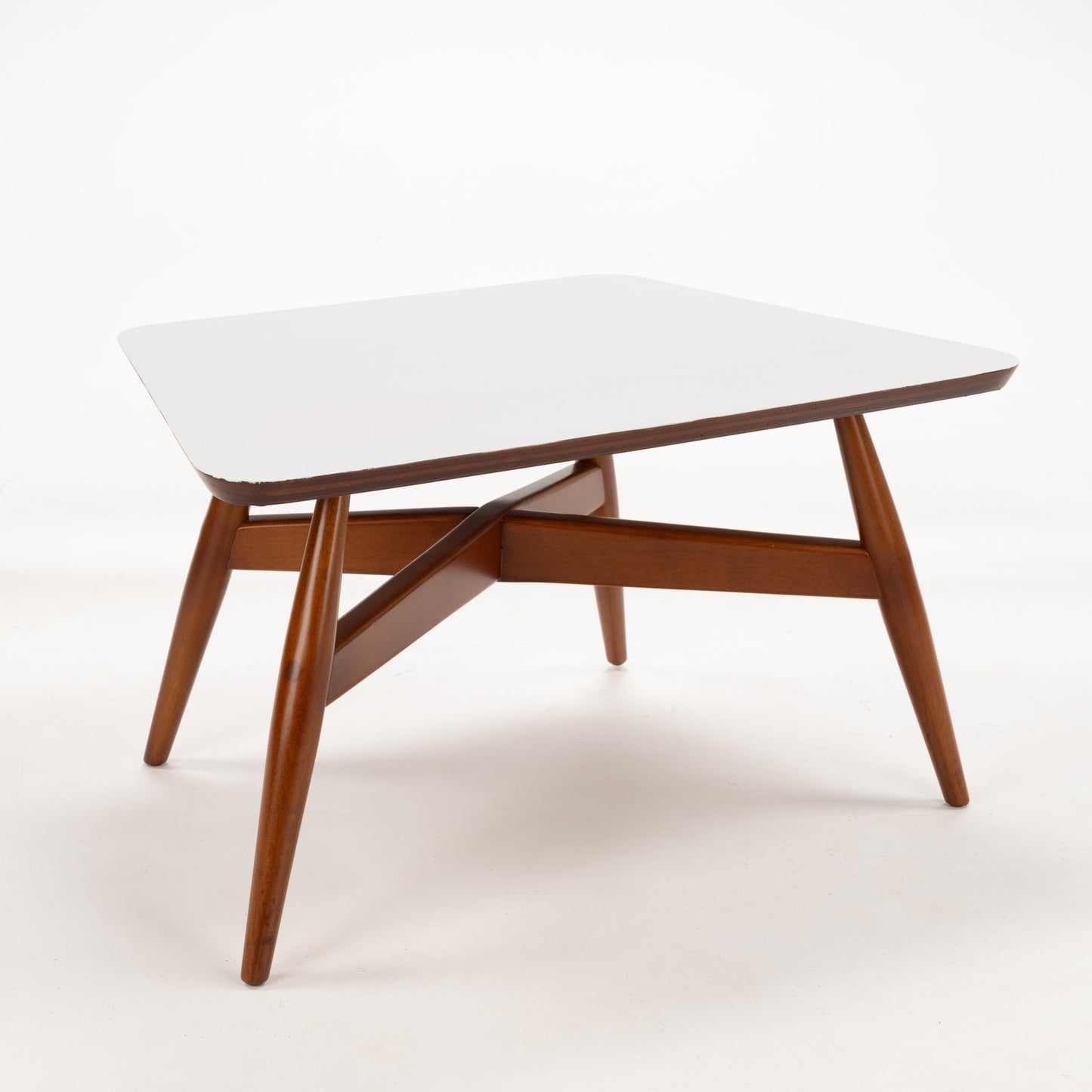 Walnut Side Table with Laminate Top featuring a crisp white rectangular surface supported by angled warm walnut legs connected with a sleek crossbeam structure, embodying mid century modern design.