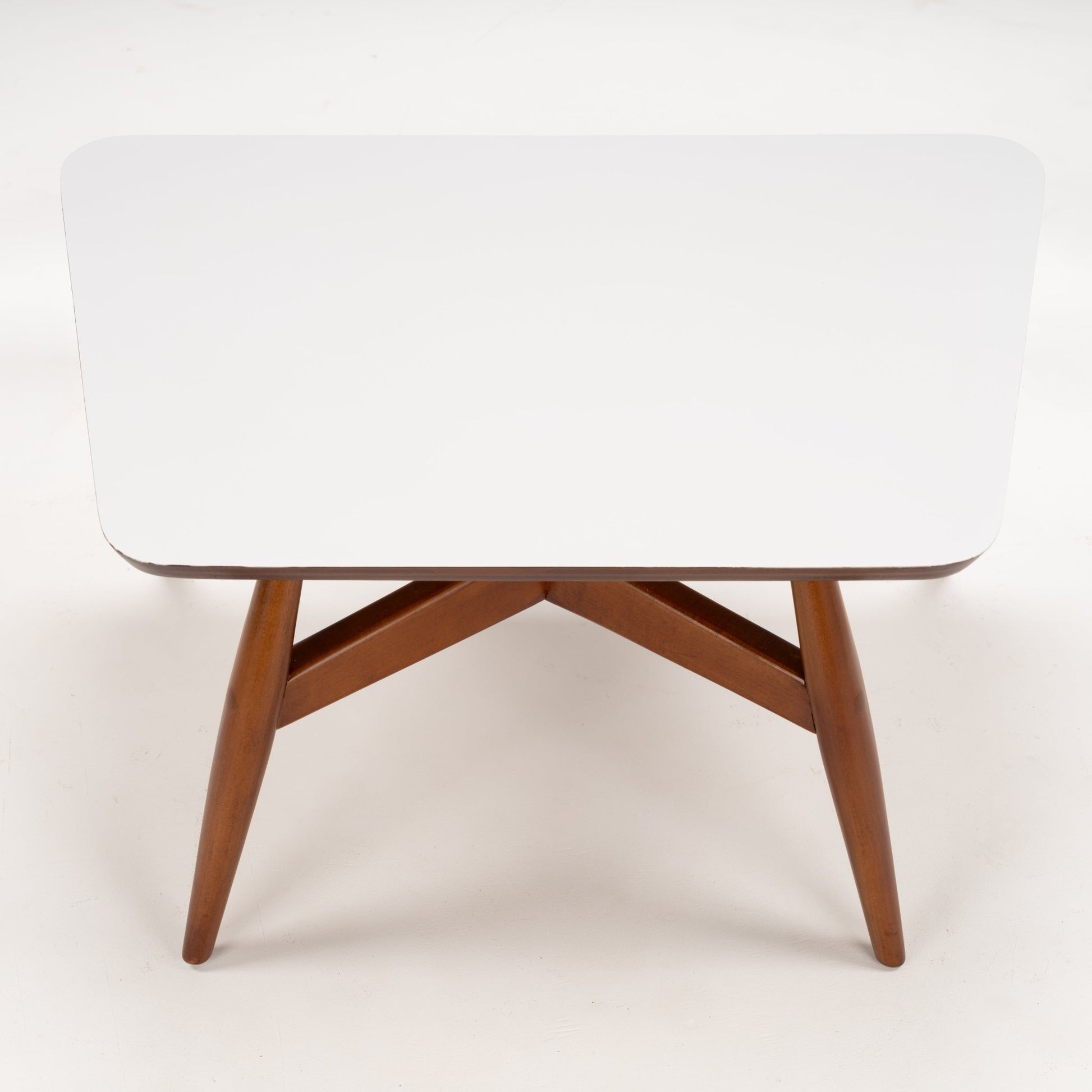 Walnut Side Table with Laminate Top featuring a smooth white rectangular surface and sturdy warm walnut legs with a sleek crossbeam design, perfect for mid century modern decor.