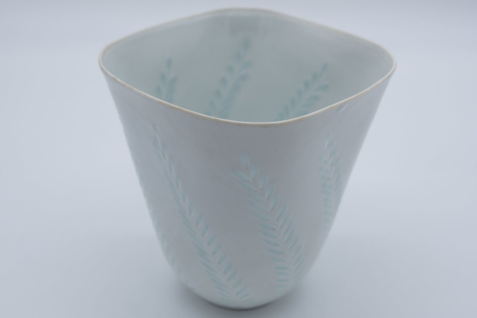 1960s Arabia Friedl Holzer-Kjellberg white rice porcelain vase with hand-cut fern pattern in pale blue glaze