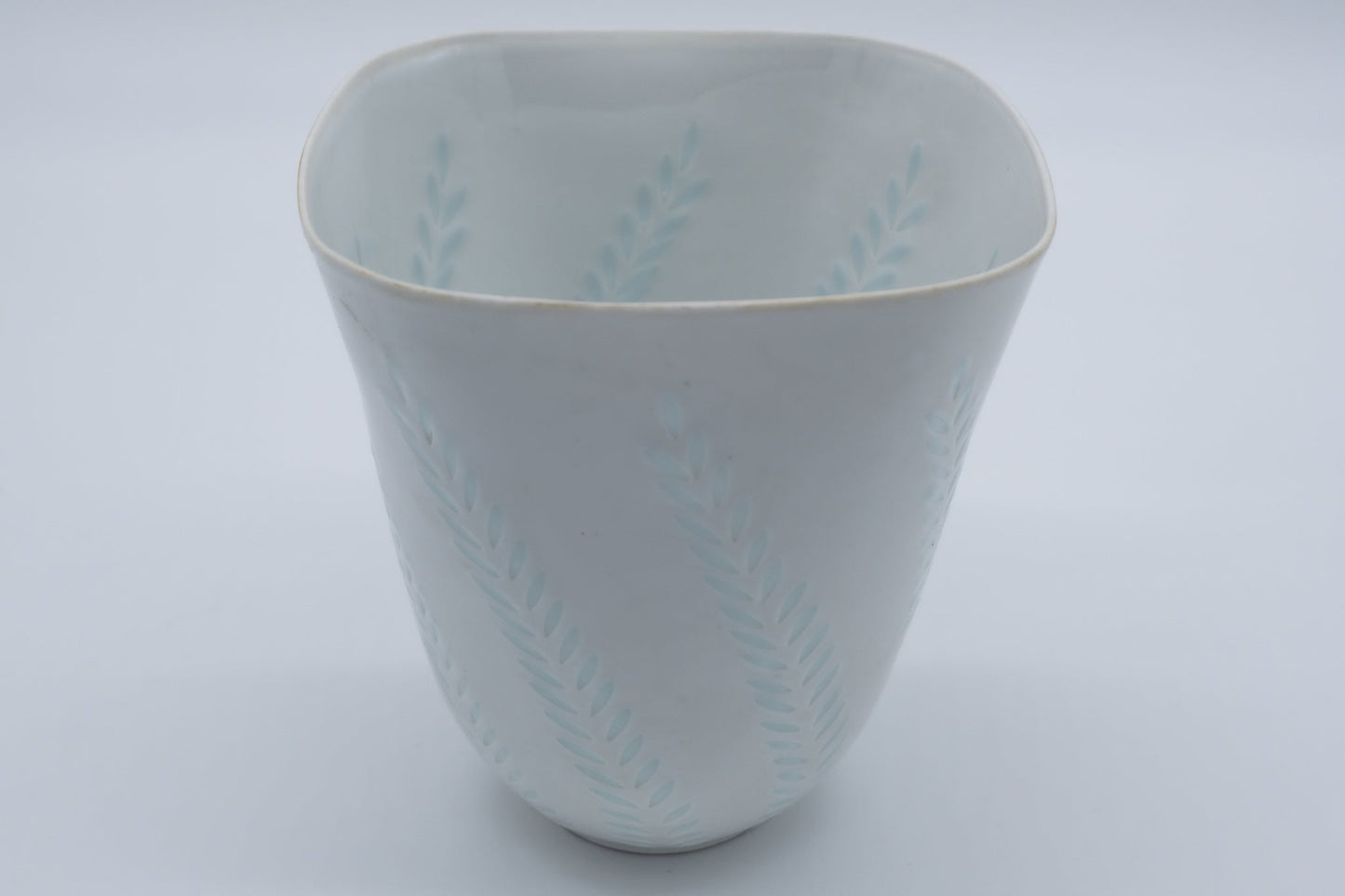1960s Arabia Friedl Holzer-Kjellberg porcelain vase with white glaze and subtle fern pattern cut details