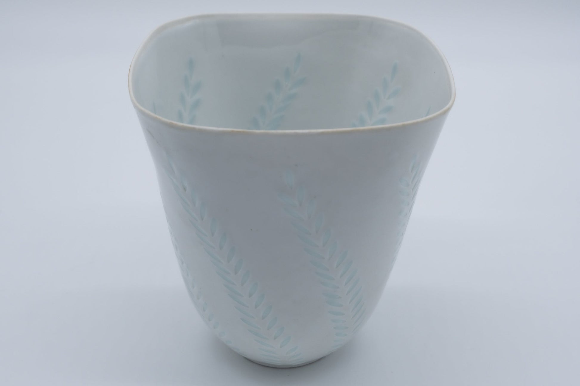 1960s Arabia Friedl Holzer-Kjellberg porcelain vase with white glaze and subtle fern pattern cut details