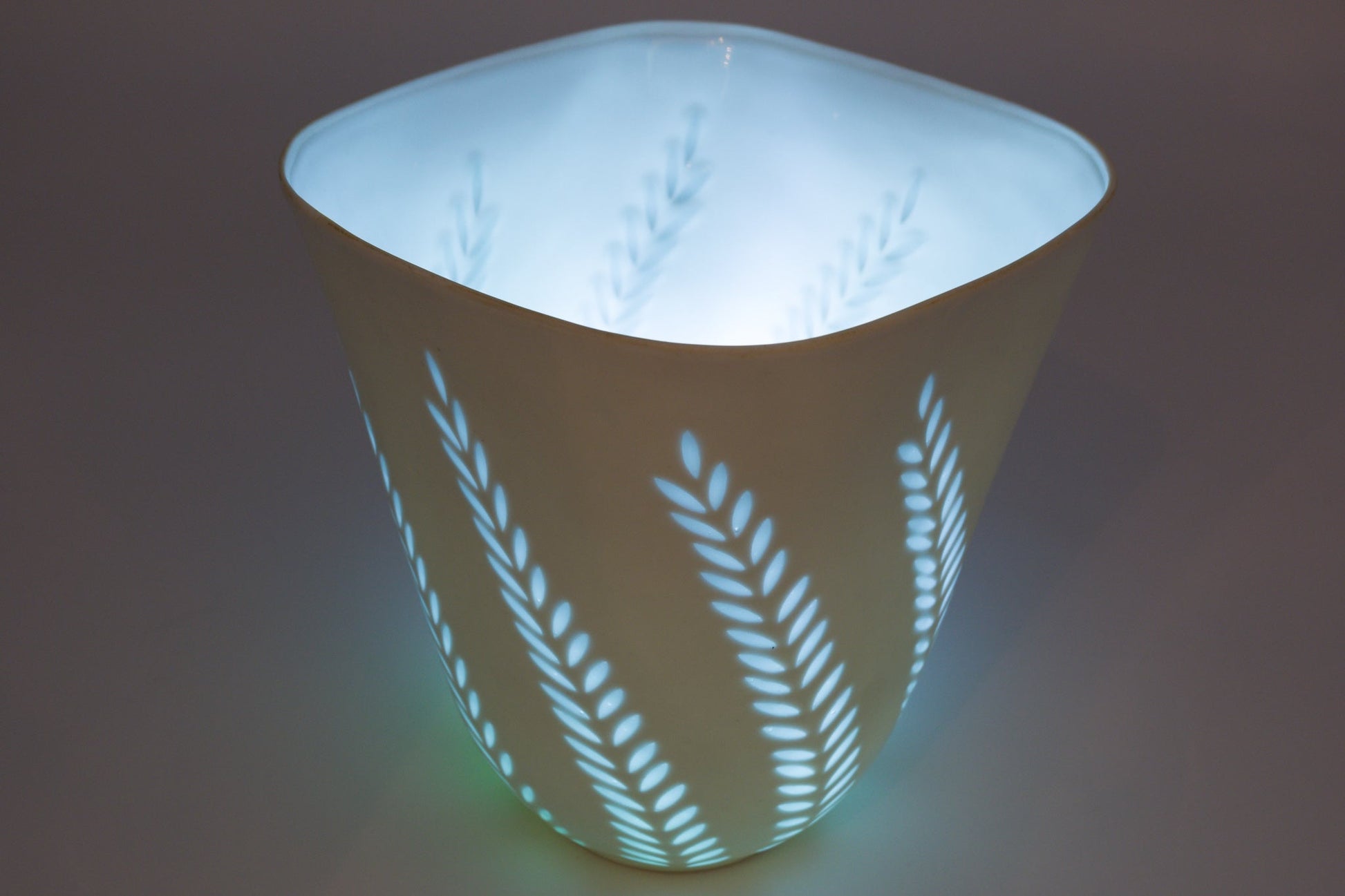 1960s Arabia Friedl Holzer-Kjellberg white rice porcelain vase with hand-cut fern pattern glowing from inside