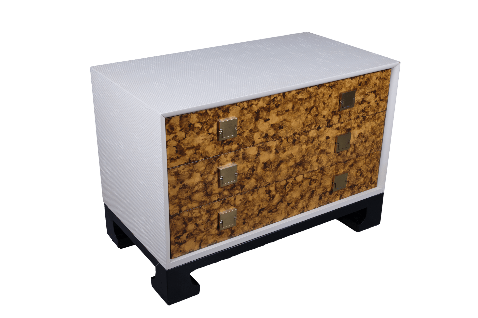 Three drawer faux tortoiseshell cabinet with white riveted sides and black lacquered base with carved feet