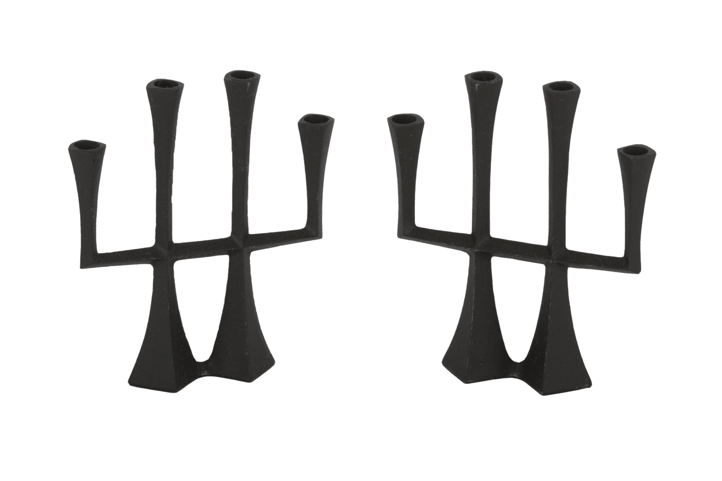Jens Quistgaard Danish 1950s cast iron candle-holder set with sculptural mid-century modern design by Dansk