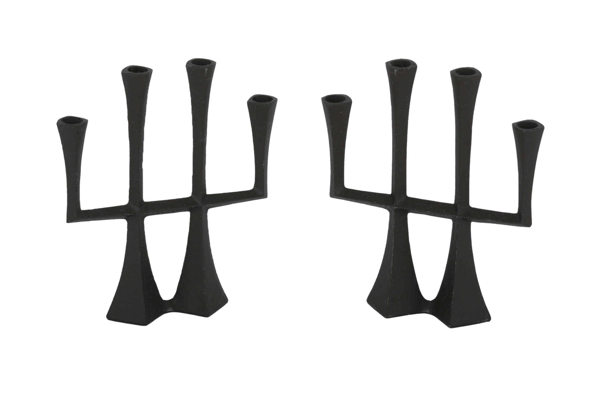 Jens Quistgaard Danish 1950s cast iron candle-holder set with sculptural mid-century modern design by Dansk