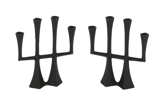 Jens Quistgaard Danish 1950s cast iron candle-holder set with sculptural mid-century modern design by Dansk