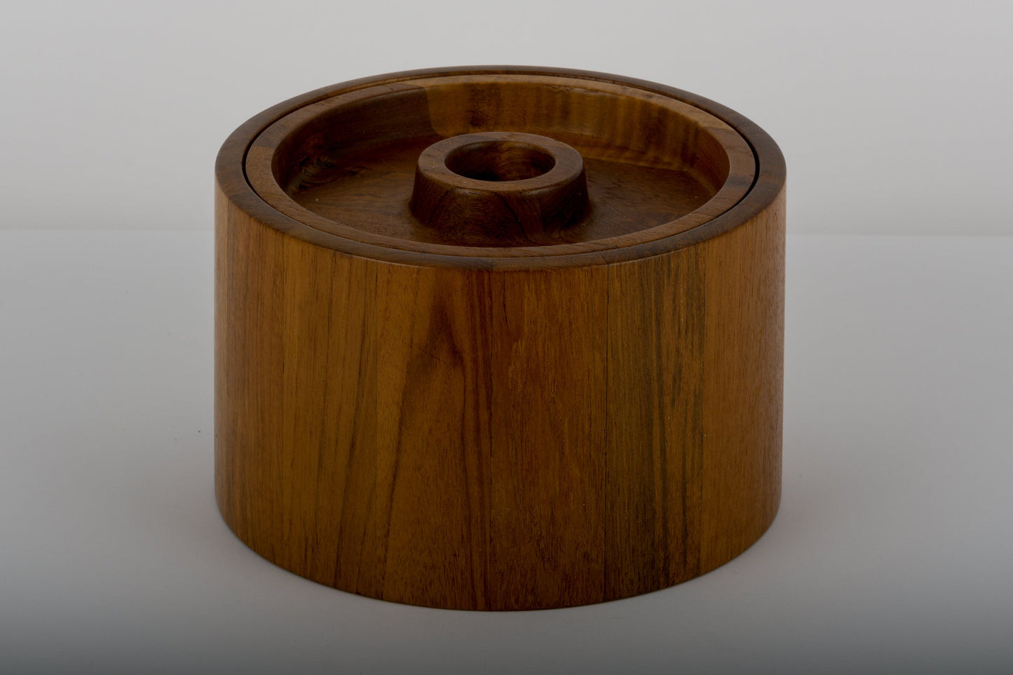 Jens Quistgaard teak ice bucket from the 1970s with a round lid and plastic-lined interior by Dansk Denmark