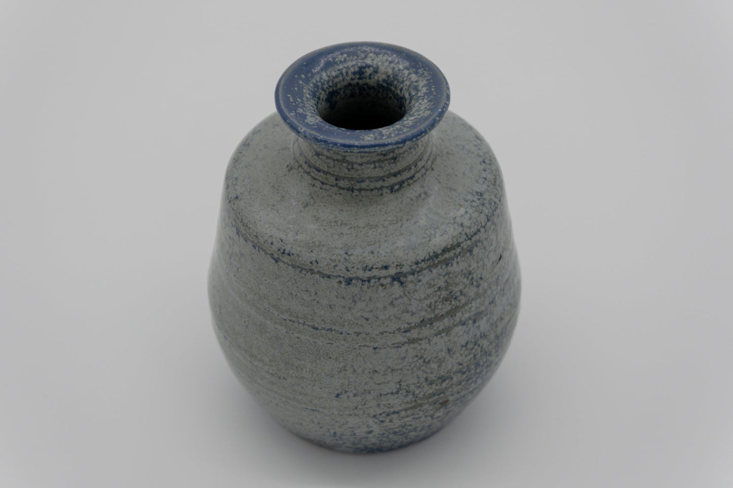 L. Hjorth stoneware vase by Erik Hjorth with unusual blue spotted glaze exemplifying Danish pottery design