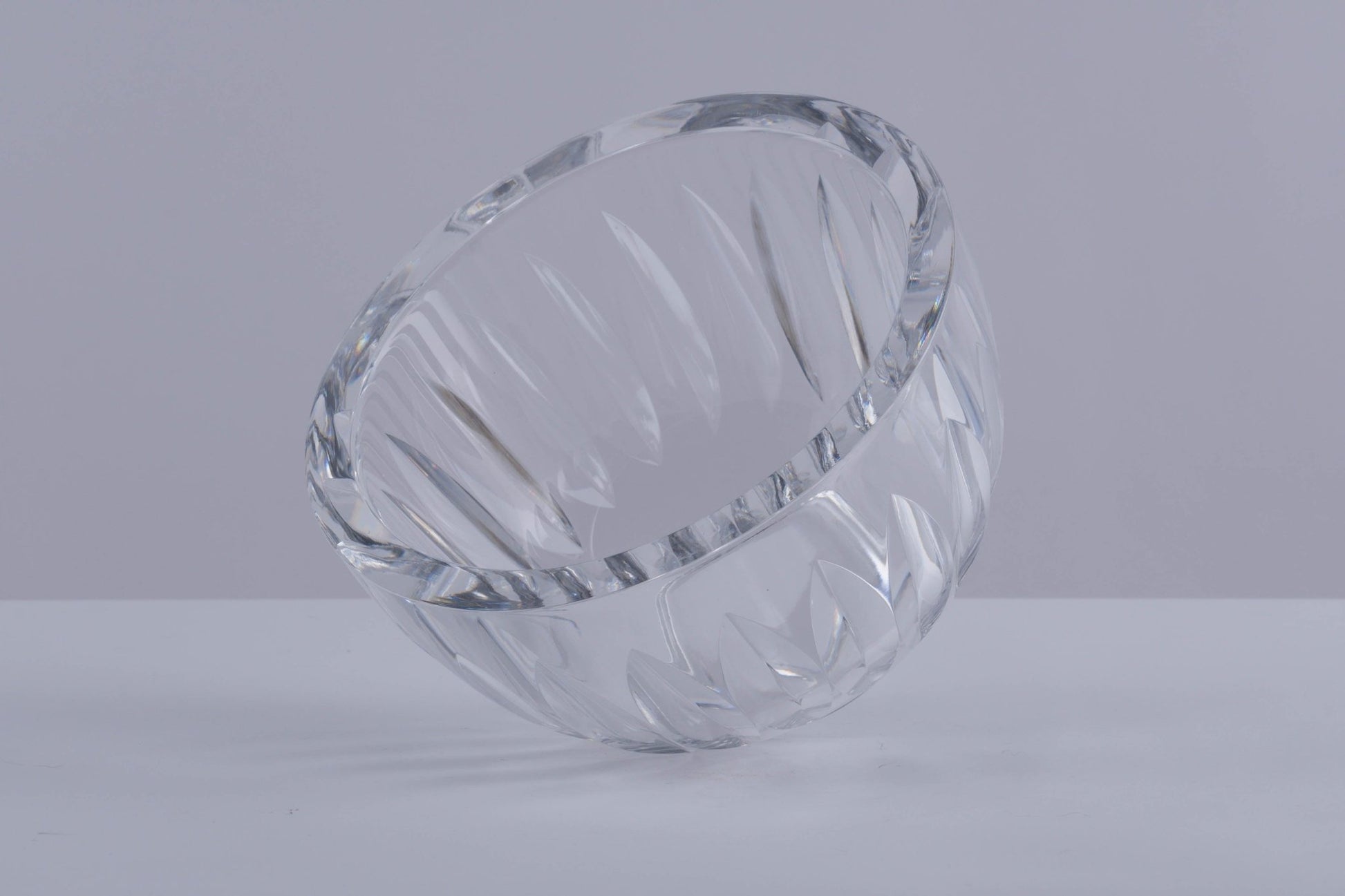 Orrefors heavy cut crystal bowl with wedge-shaped cut pattern throughout the outer surface, Swedish design by Sven Palmqvist