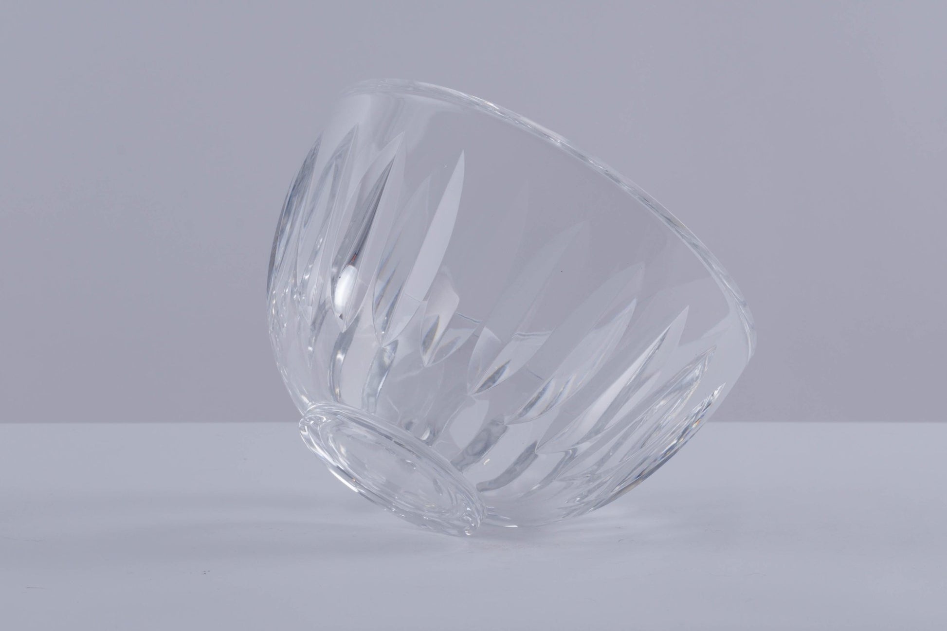 Heavy Orrefors crystal bowl with wedge-shaped cuts throughout, designed by Sven Palmqvist, Swedish mid-century design.