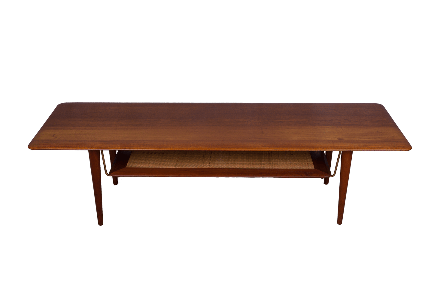 Mid-century modern teak coffee table by Peter Hvidt and Orla Molgaard-Nielsen with cane shelf and tapered legs.