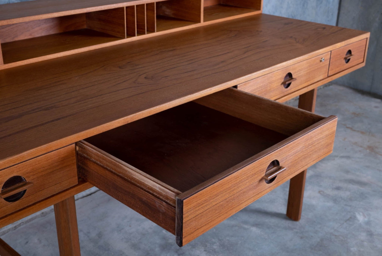 Peter Lovig Nielsen mid-century modern rosewood desk with open drawer, clean lines, and integrated storage compartments