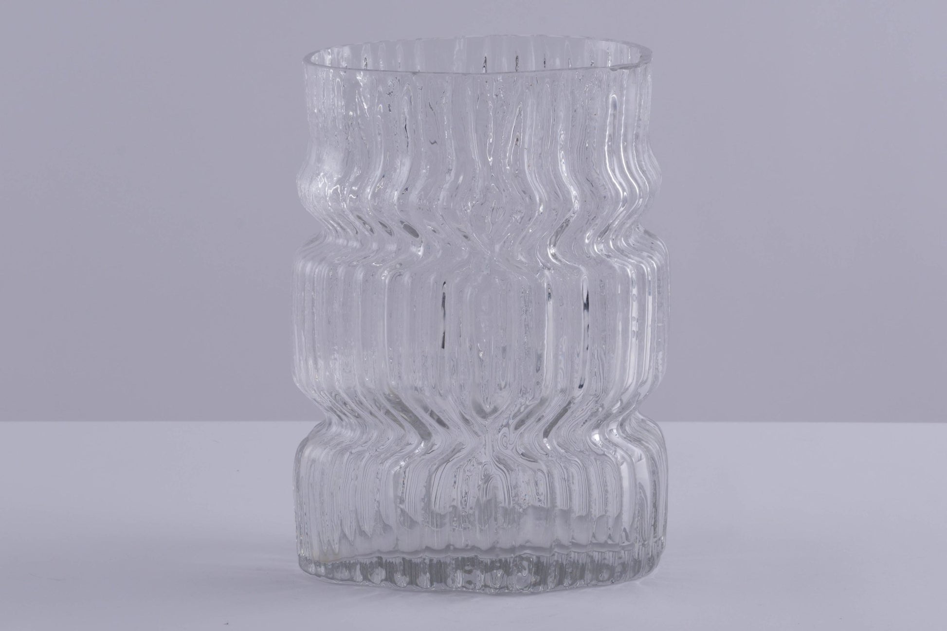 Rosenthal Studio Line vase designed by Tapio Wirkkala with textured glacier-like clear glass exterior from the 1960s