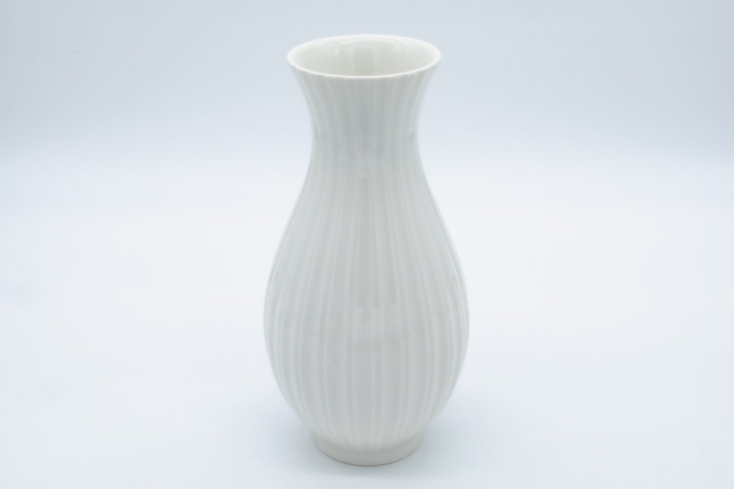 Royal Copenhagen white fluted porcelain vase by Thorkild Olsen, Blanc de Chine technique, Danish pottery design.