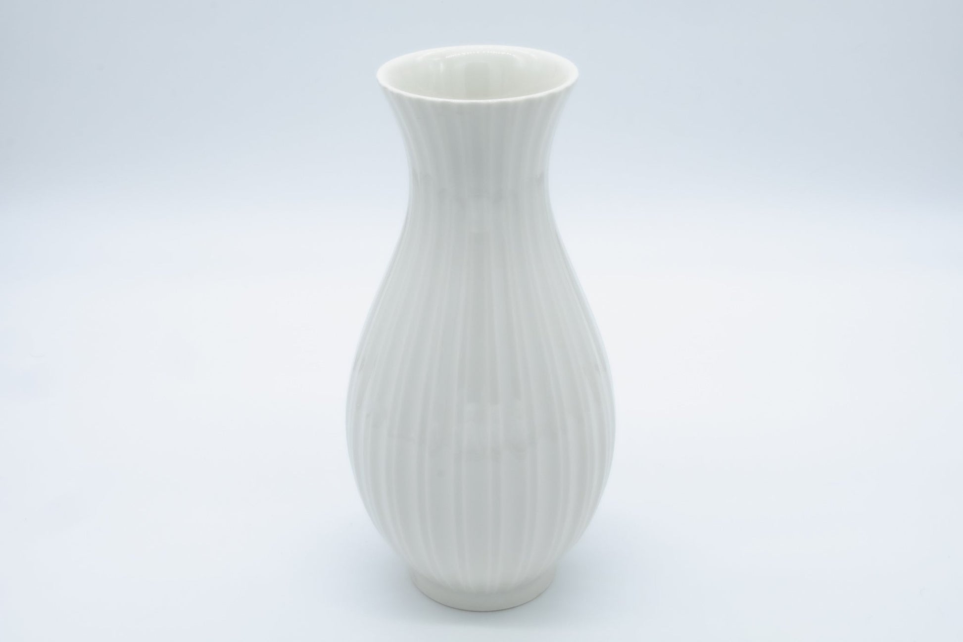Royal Copenhagen white fluted porcelain vase by Thorkild Olsen, Blanc de Chine technique, Danish pottery design.