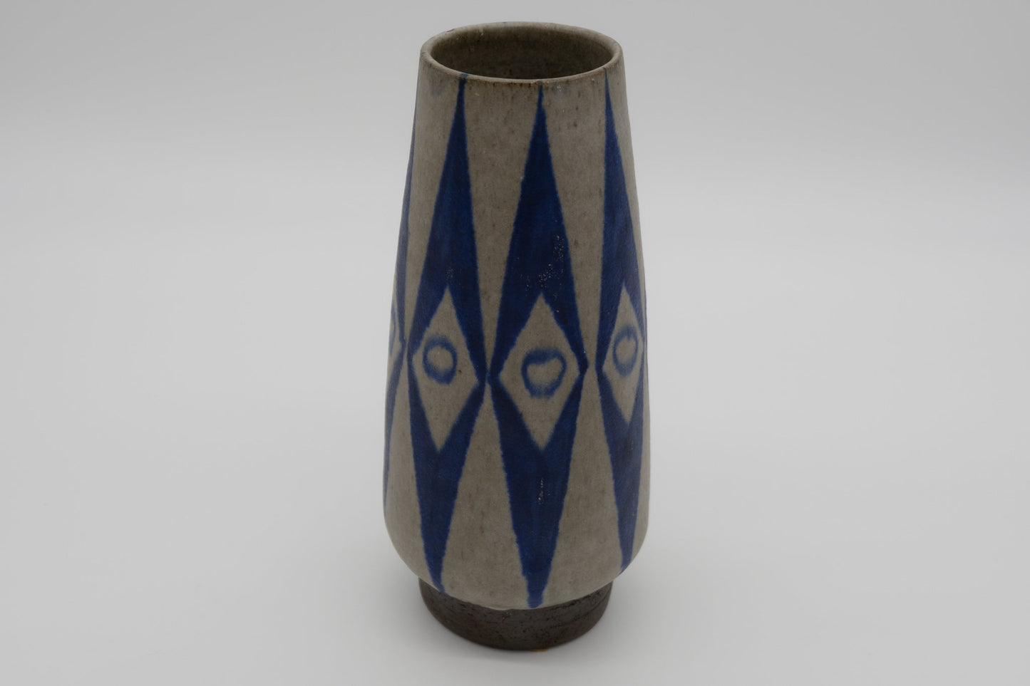 Mid-century Danish ceramic vase by Thomas Toft with tapered body and blue abstract geometric glaze design