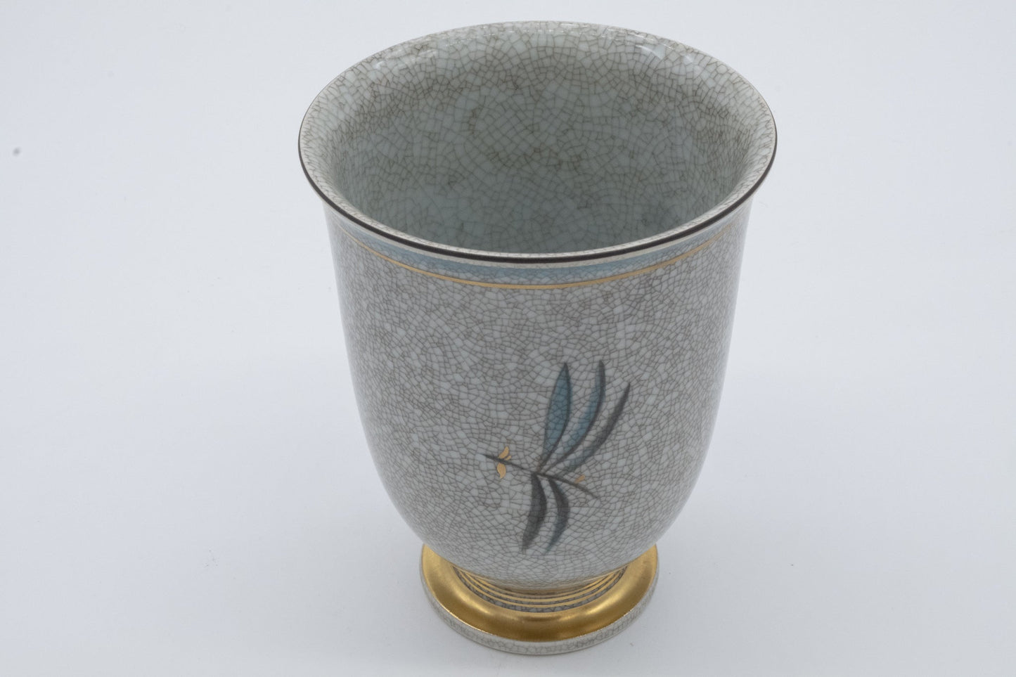 Vintage Royal Copenhagen Thorkild Olsen ceramic vase with craquele glaze and delicate flower and insect motifs on gold base.