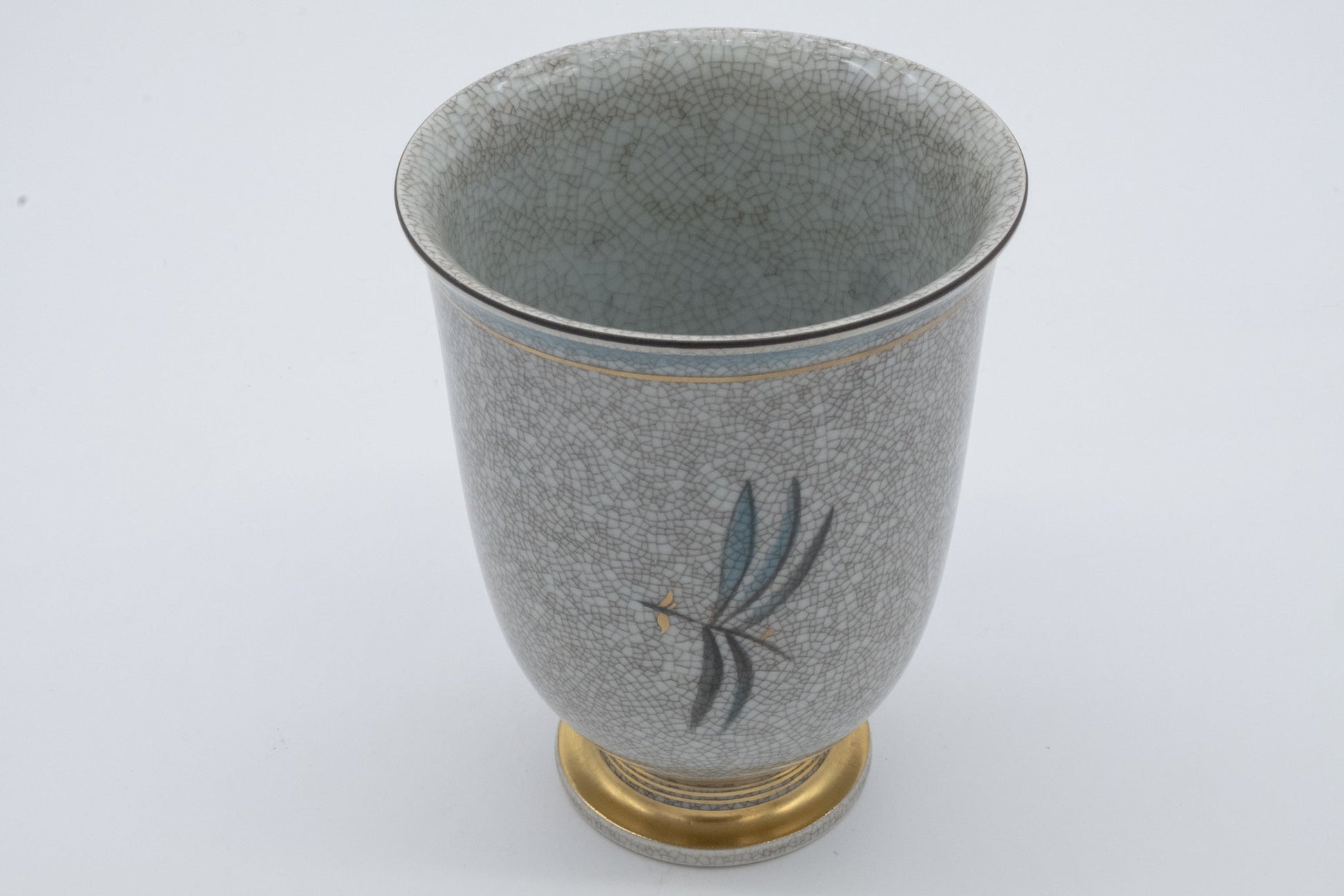Vintage Royal Copenhagen Thorkild Olsen ceramic vase with craquele glaze and delicate flower and insect motifs on gold base.
